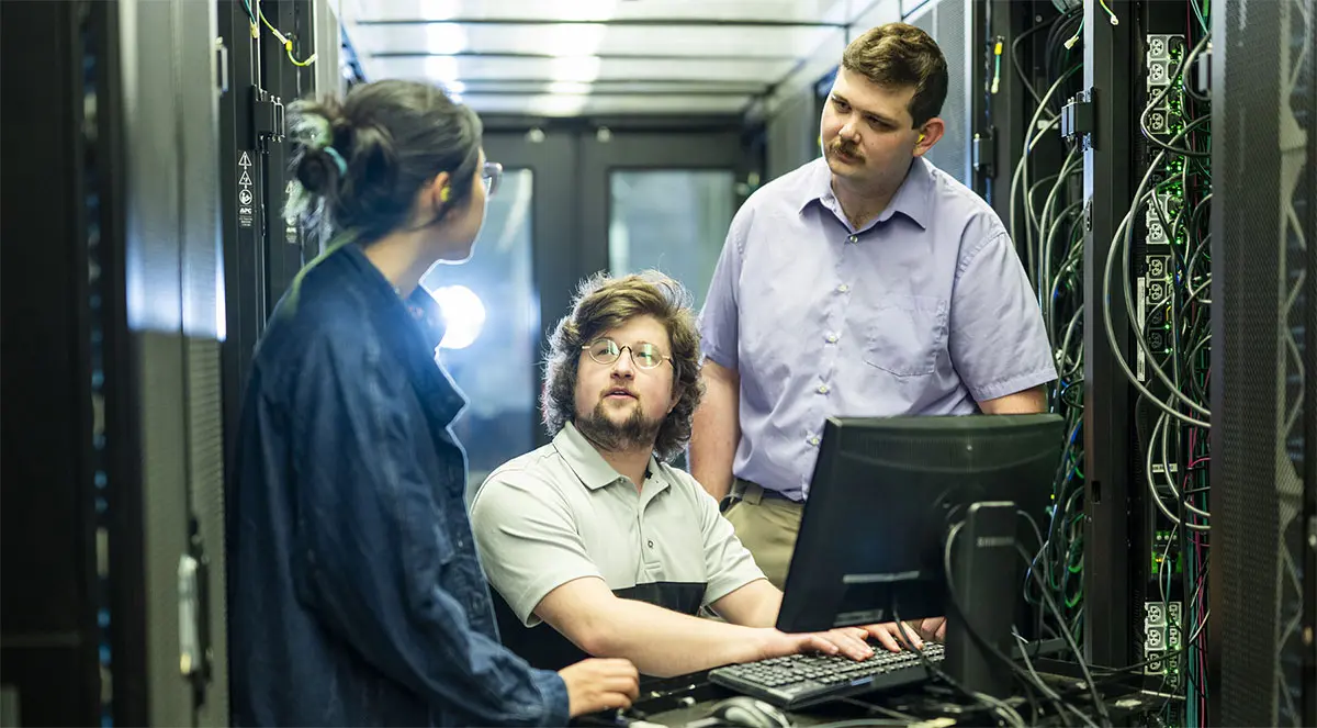 Members of the Center for High Throughput Computing at the Discovery Building in Madison, Wis.